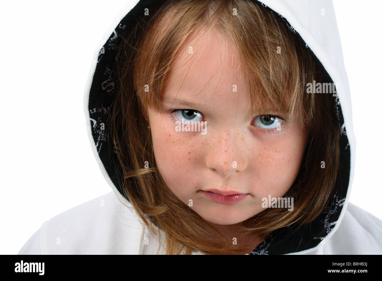 Small girl with long hair in white hood isolated on white Stock Photo