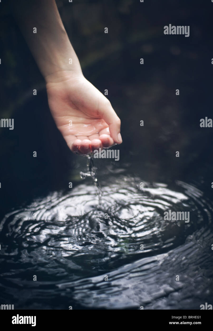 hand cupping water Stock Photo