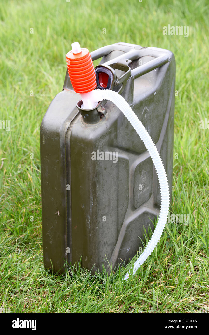 fuel jerry can with plastic syphon Stock Photo