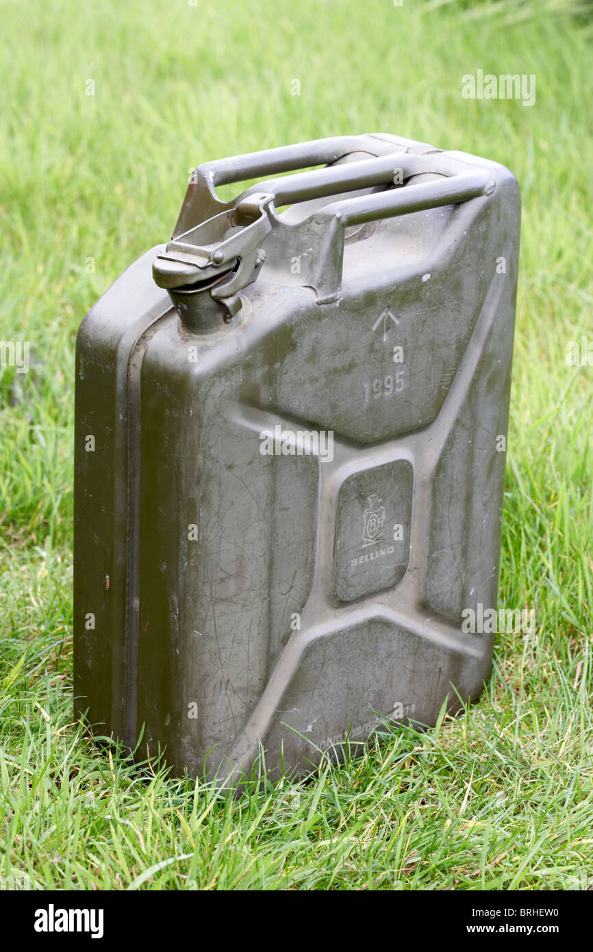 spare stockpiled petrol diesel in an old metal fuel jerry can Stock Photo
