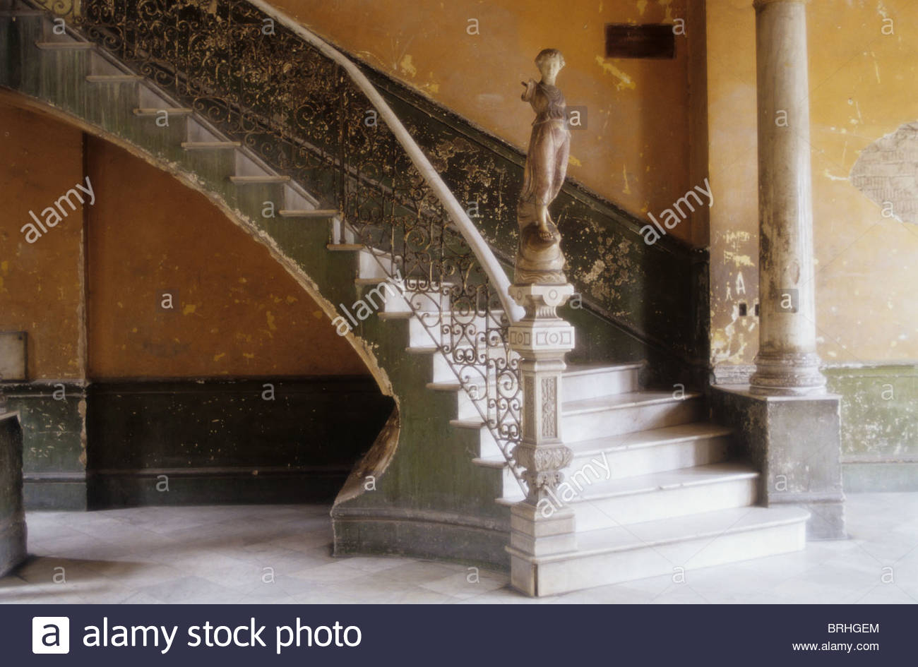 A circular marble staircase and statue in central in central Havana. Stock Photo
