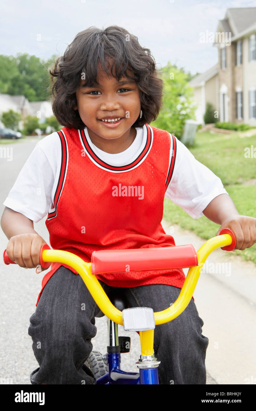 Little Boy Riding Bike Stock Photo