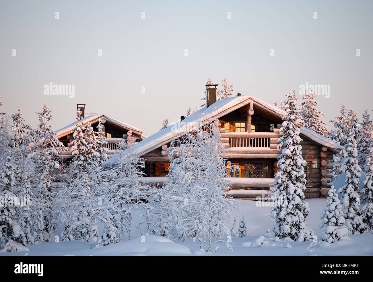 wooden house in winter forest Stock Photo - Alamy