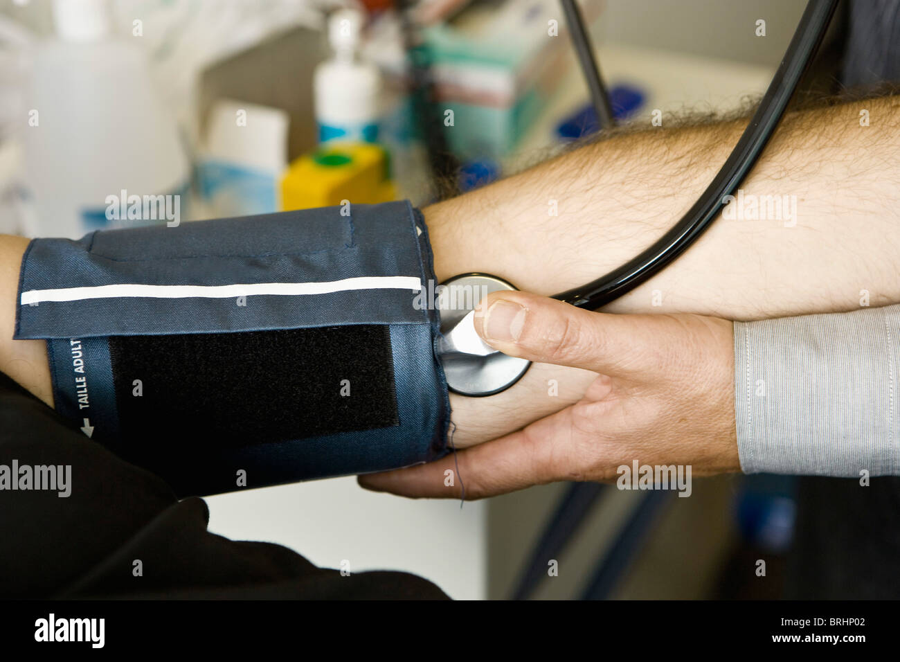 Doctor holds blood pressure hi-res stock photography and images - Alamy