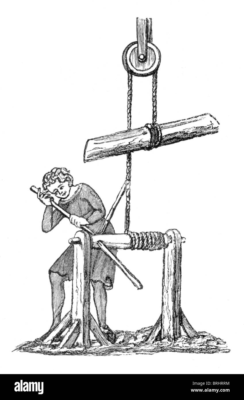 Black and White Illustration; Fourteenth century windlass and pulley system used for lifting heavy objects Stock Photo