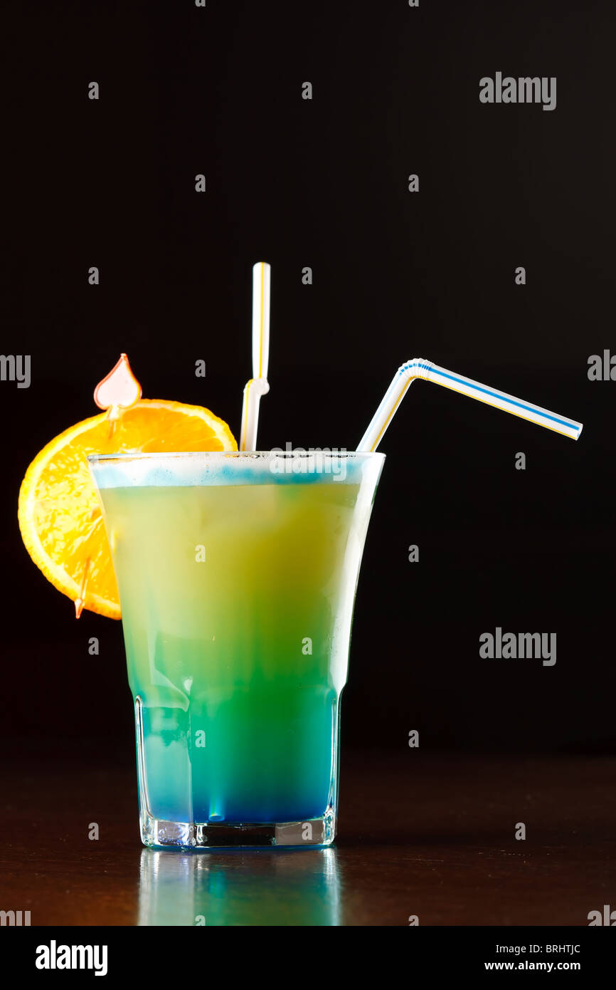 Summer drink decorated with a slice of orange Stock Photo - Alamy