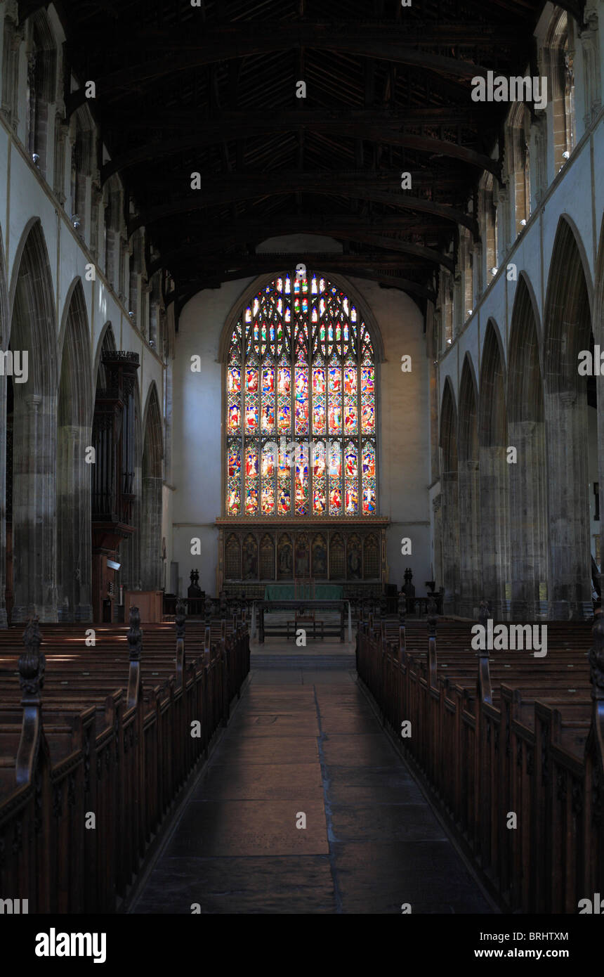 Inside St Nicholas' Chapel, King's Lynn' looking to the stained glass window. Stock Photo