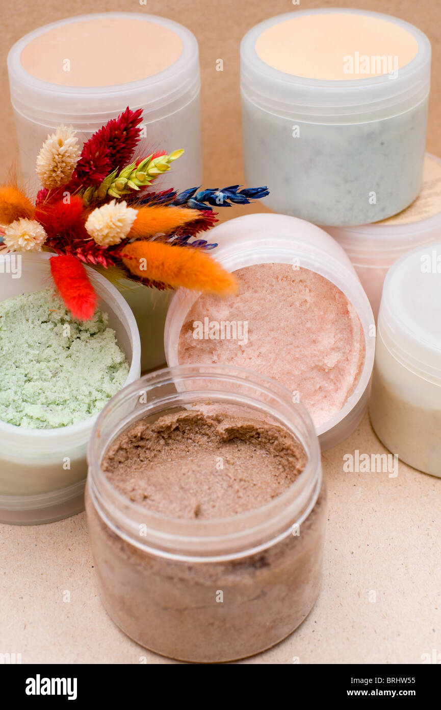 some plastic jars with coloured saline body scrub Stock Photo Alamy