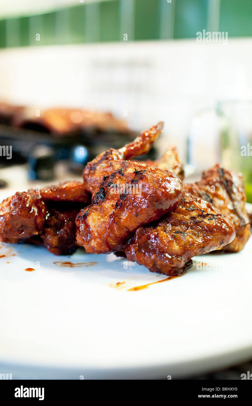Chicken wings in BBQ sauce Stock Photo - Alamy