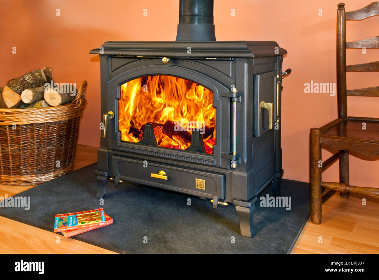 A Franco Belge wood burning stove with beautiful flames Stock Photo - Alamy