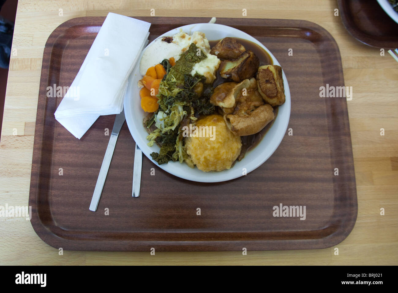 Canteen roast dinner, school dinner style on a melamine tray. Devon, England, United Kingdom. Stock Photo