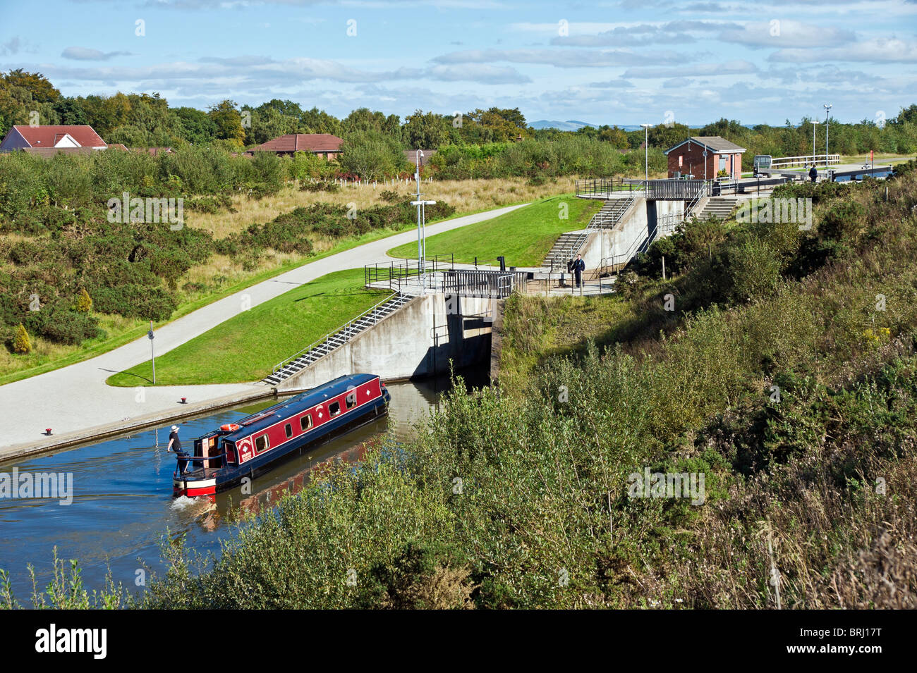 Canal boat approaching the first lock on the Union Canal near Falkirk