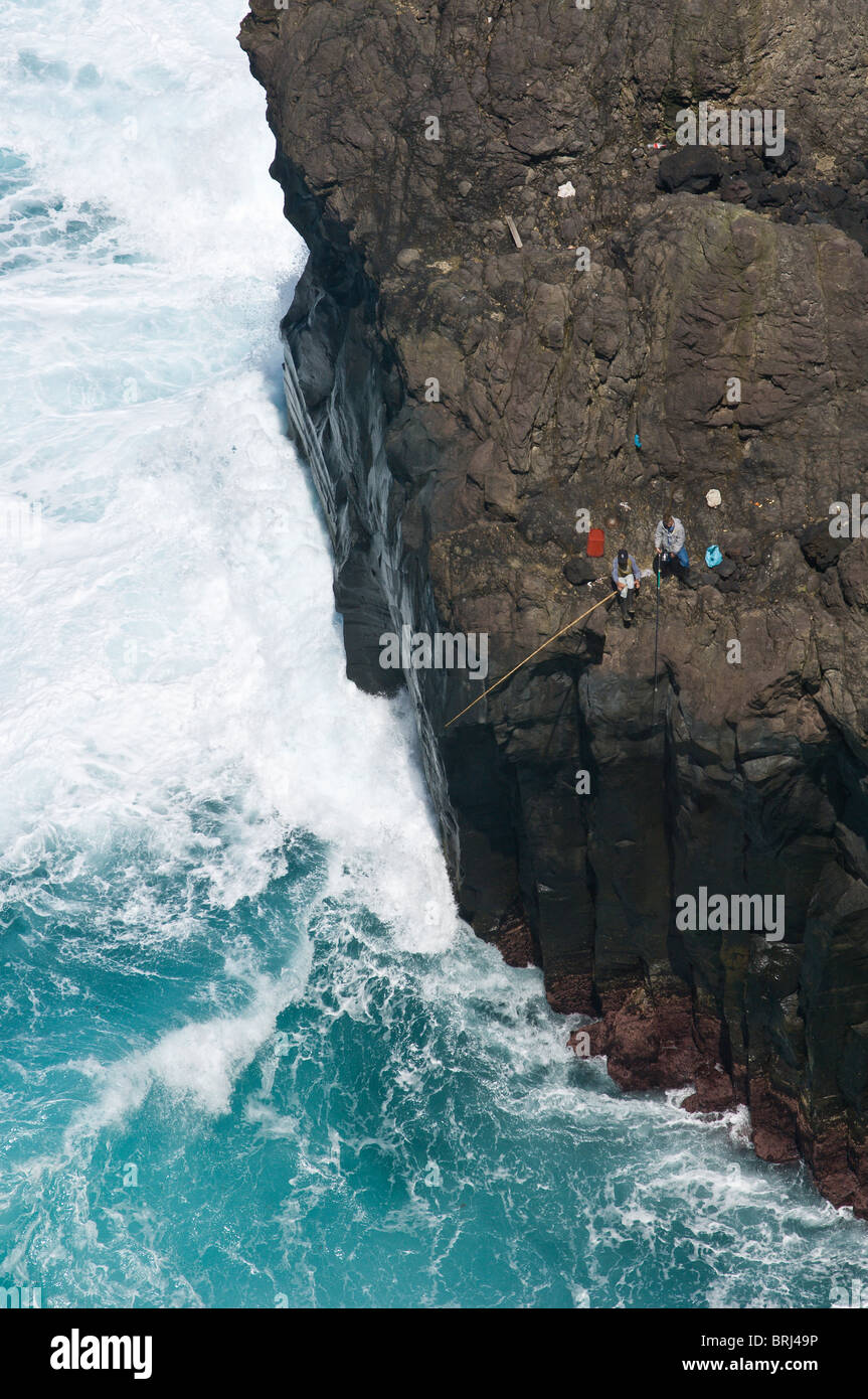 Fishermen at Ponta do Raminho near the village of Raminho, Angra do Heroísmo, Terceira, Azores, Portugal. Stock Photo