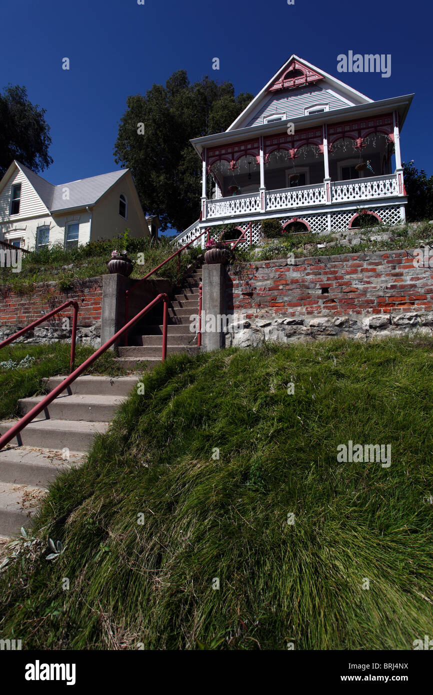 Small town American house, festooned with Americana, on the top of a