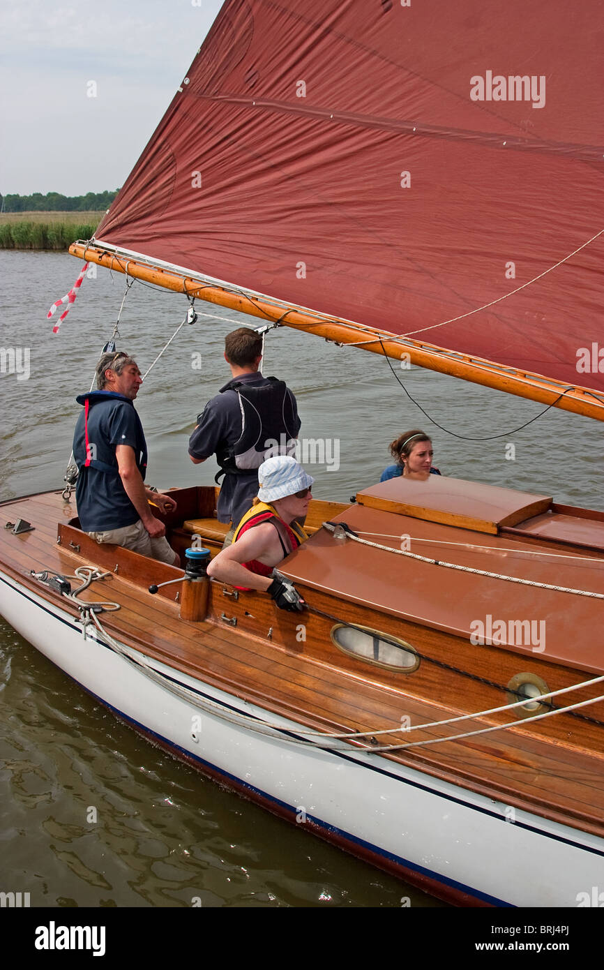 A Broads cruiser about to negotiate the Acle bridges during the 3 Rivers Race. Stock Photo