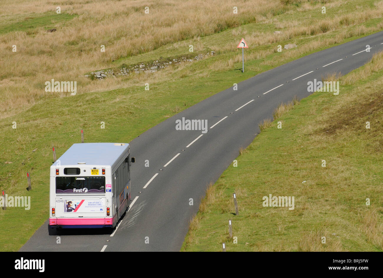 Dartmoor National Park Devon England UK A public service bus enroute across the famous parkland Stock Photo