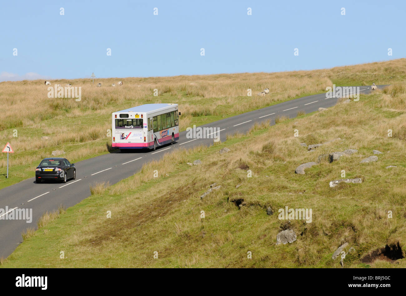 Dartmoor National Park Devon England UK A public service bus enroute across the famous parkland Stock Photo