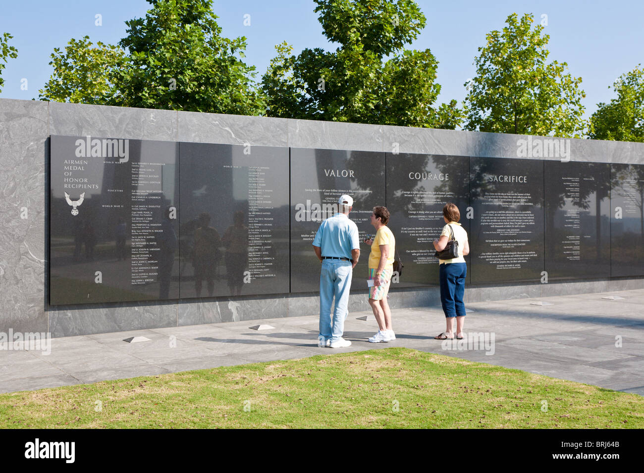 Visitors reading memorial wall to honor Airmen Medal of Honor recipients at the United States Air Force Memorial in Arlington, Stock Photo