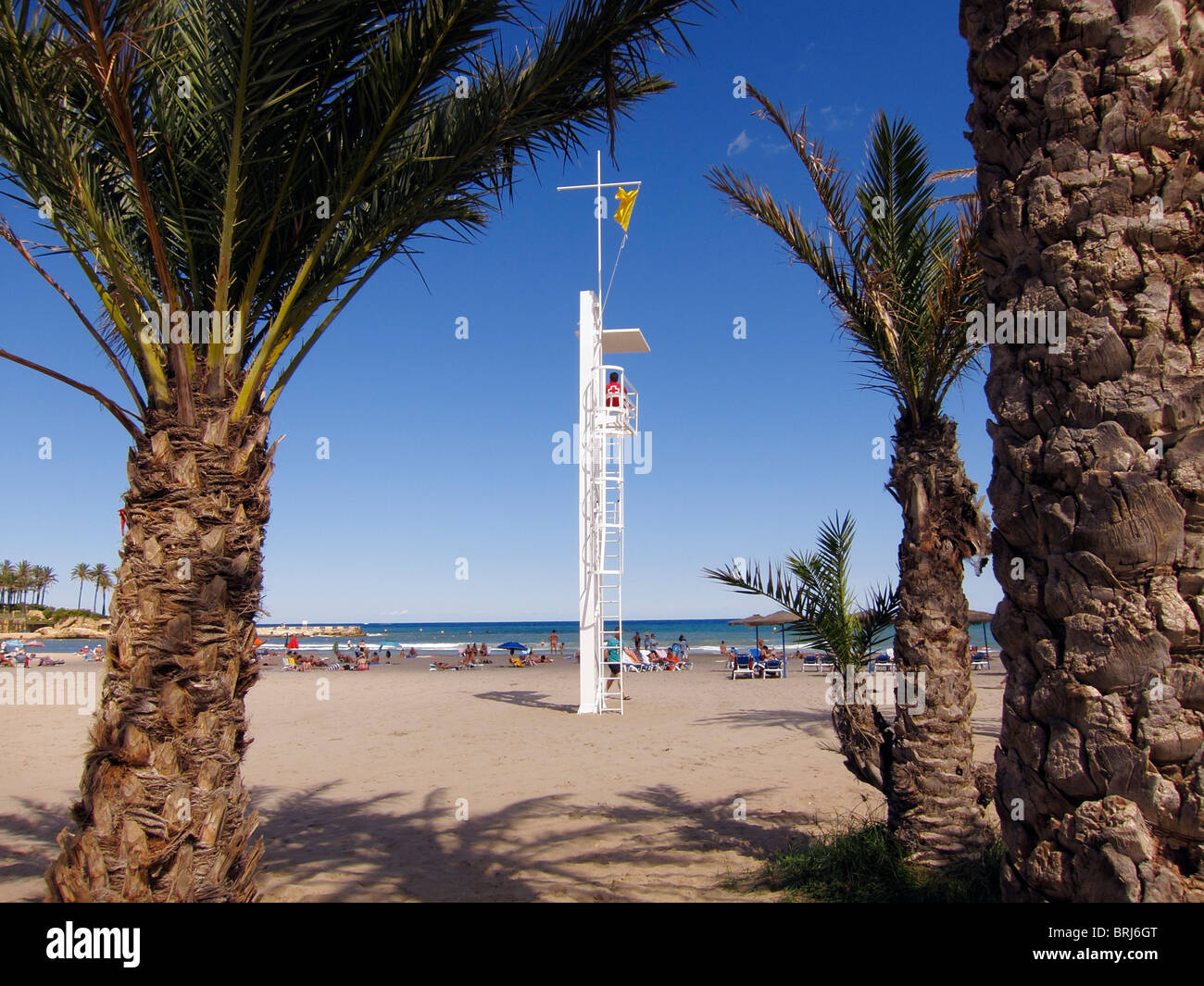 A coast guard tower on the beach in the Spanish seaside town of Javea Stock Photo