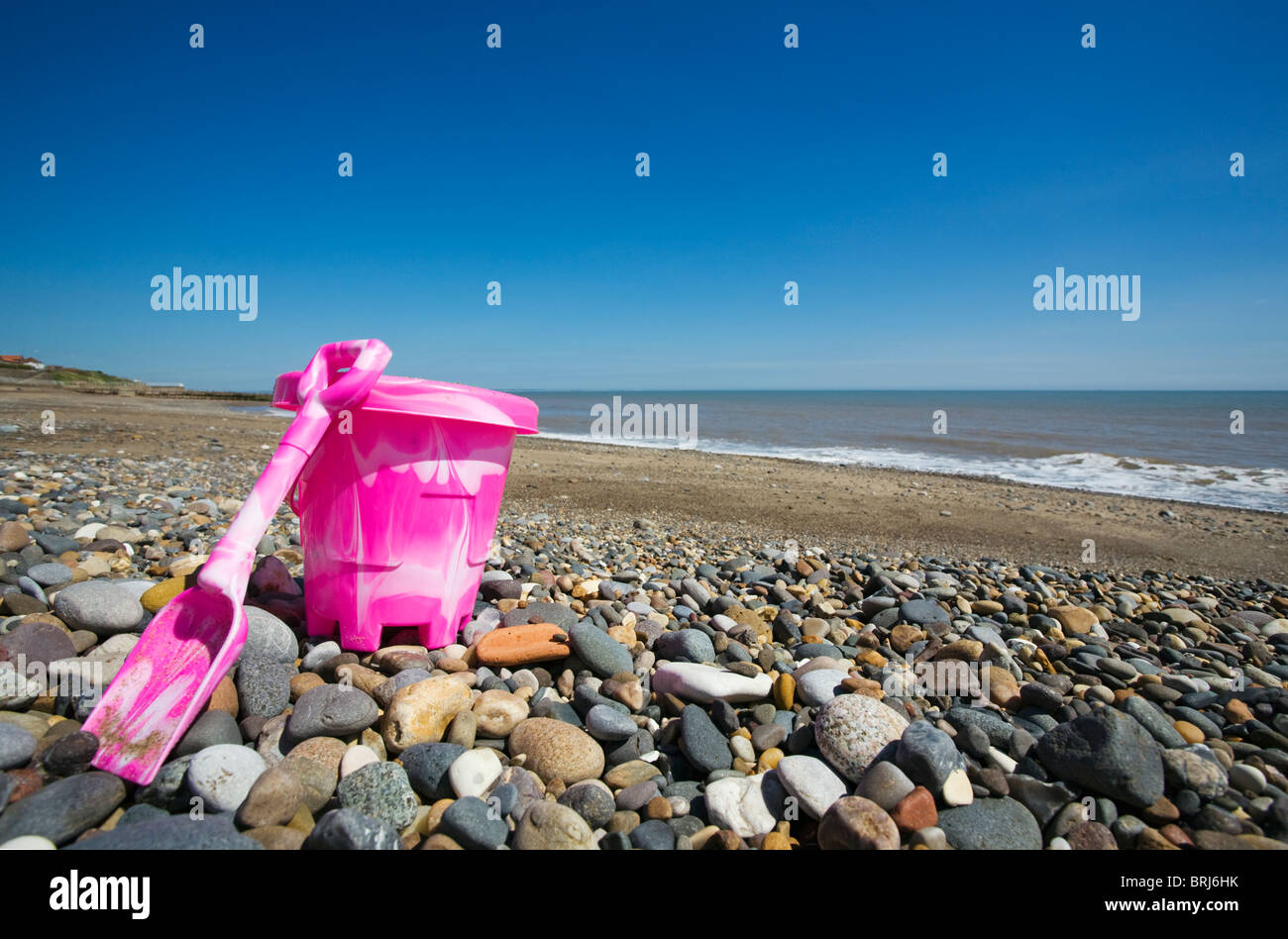 Child's bucket and spade on Hornsea beach Stock Photo Alamy