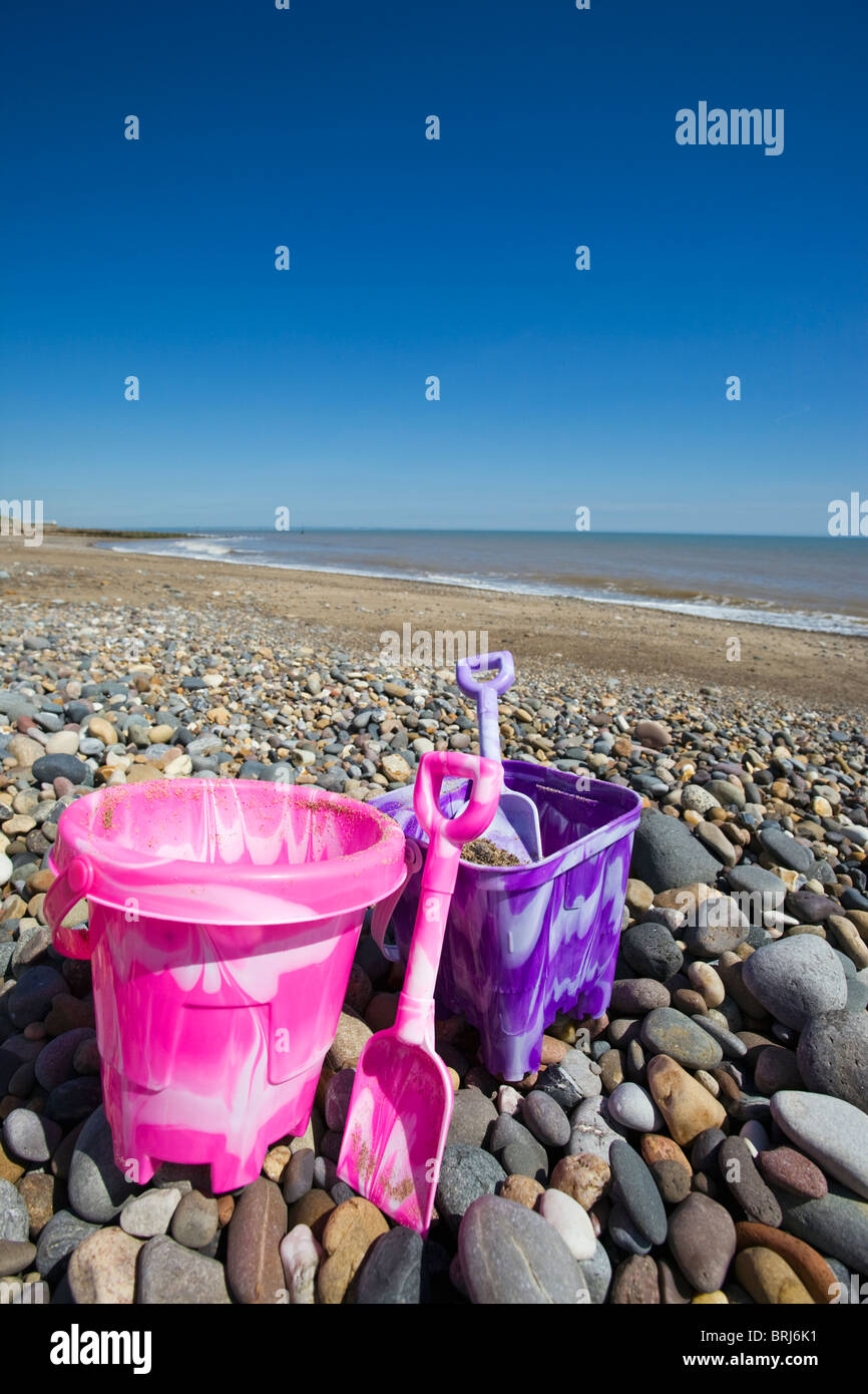 Child's buckets and spades on Hornsea beach Stock Photo Alamy