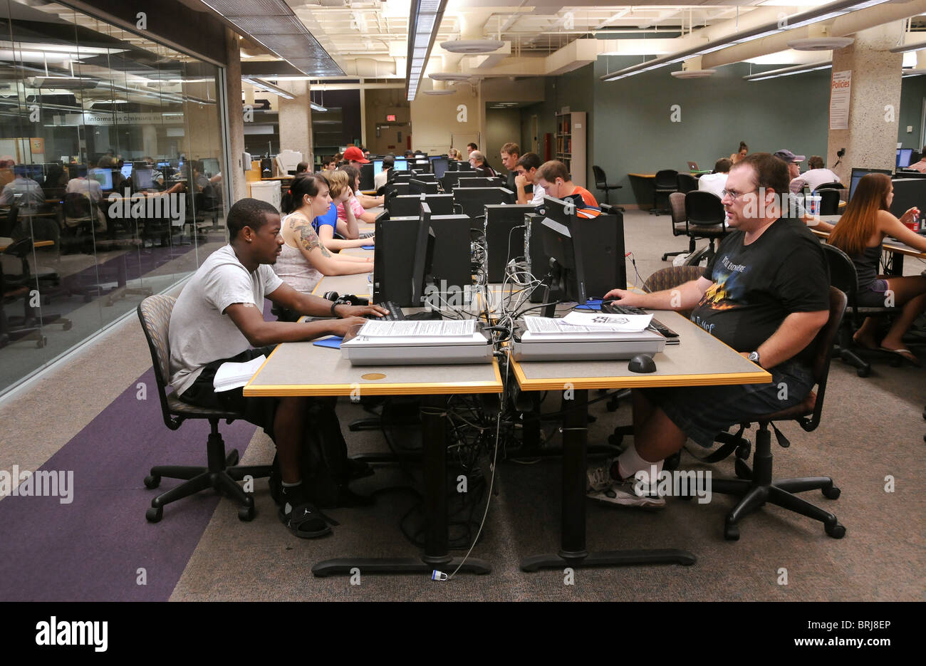 Students work in the Information Commons in the Main Library at the