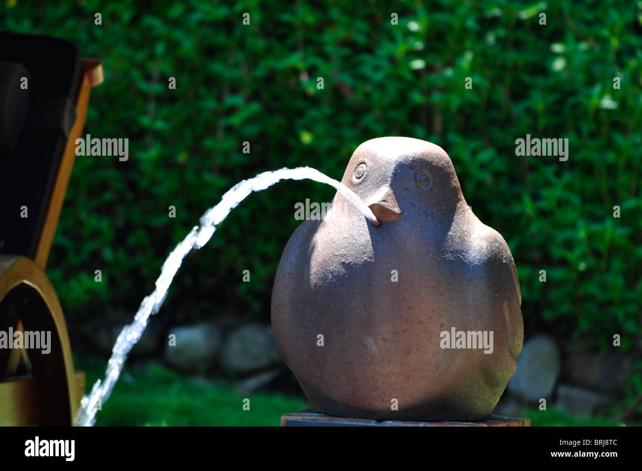 Stone bird as fountain at the pool in Hue, Vietnam Stock Photo