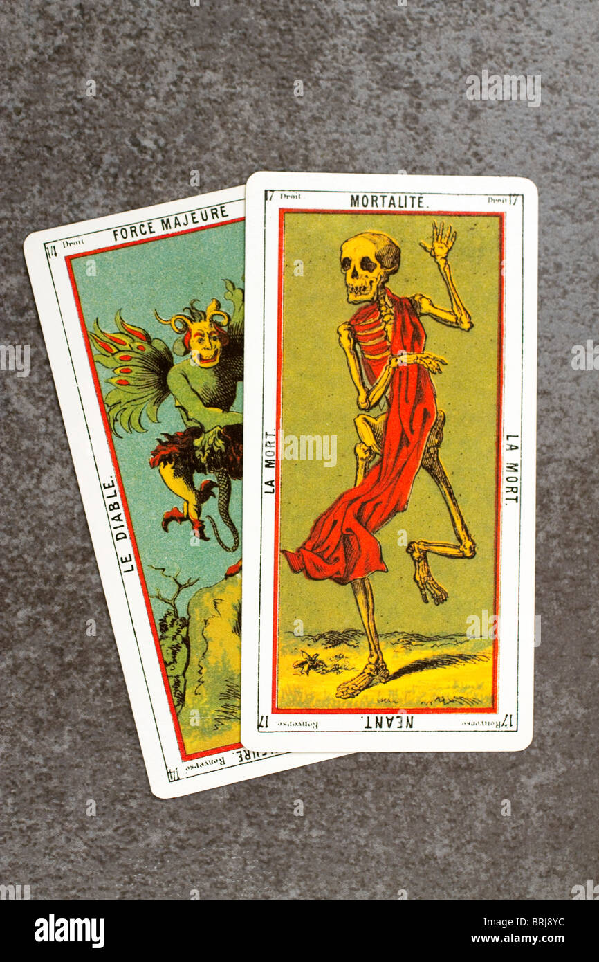Cards representing the Devil and Death from an ancient set of Tarot, used for divination. Stock Photo