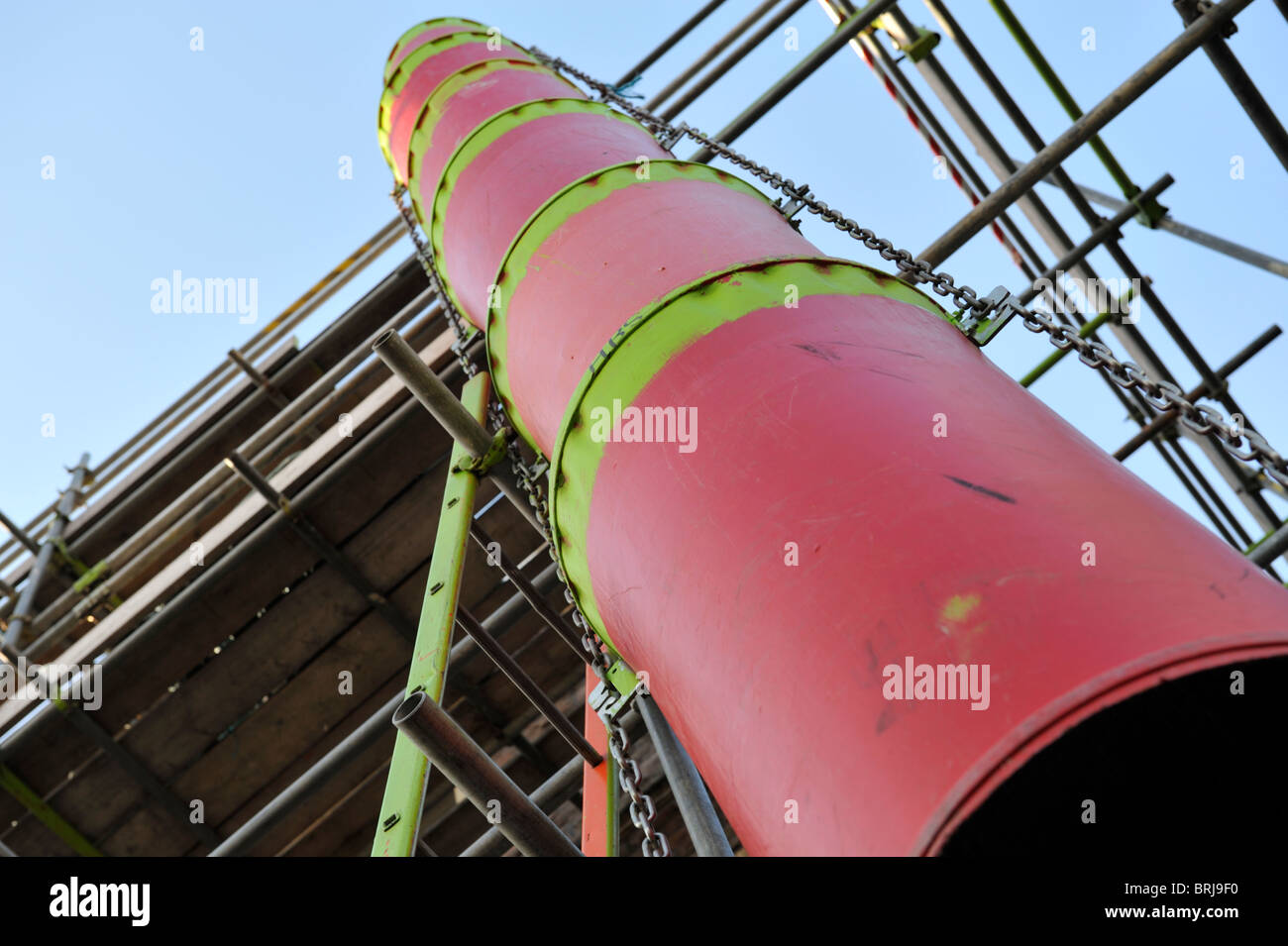 Builders scaffolding waste chute Stock Photo