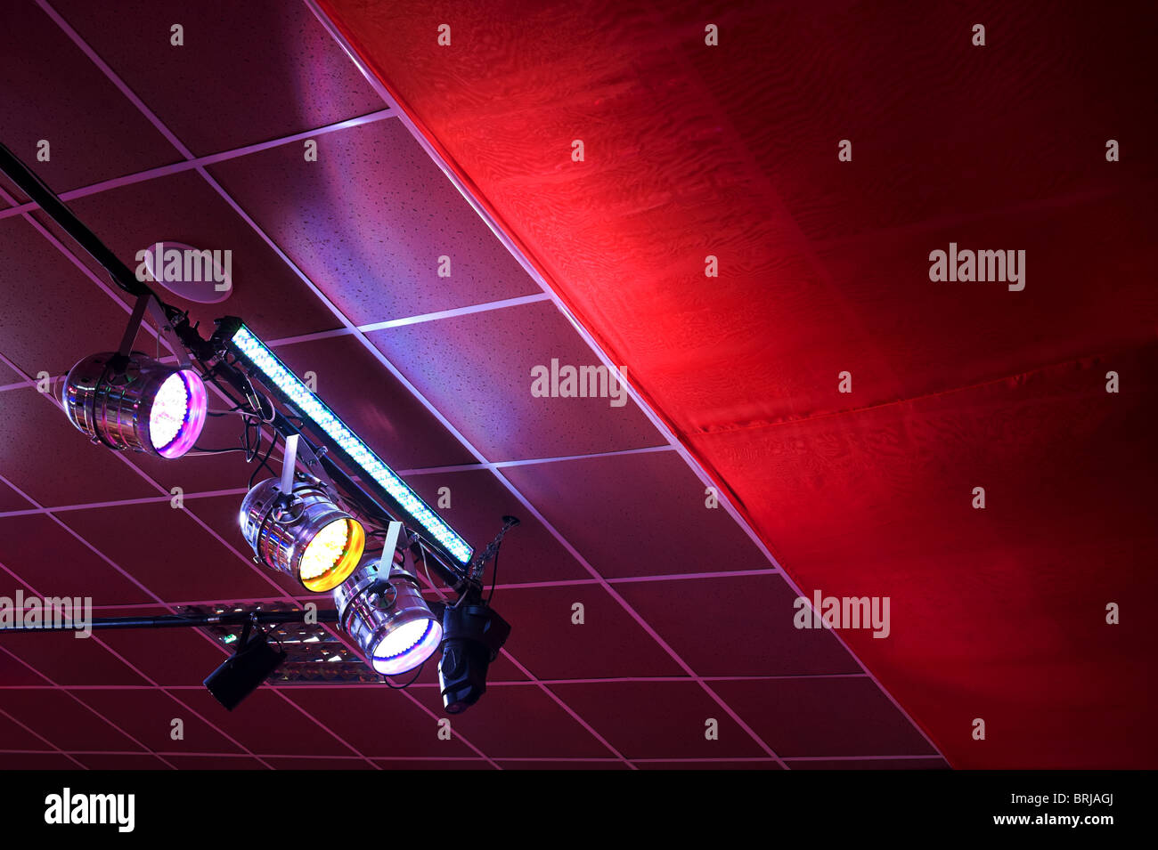 set of stage suspended spotlights under ceiling, copy space Stock Photo