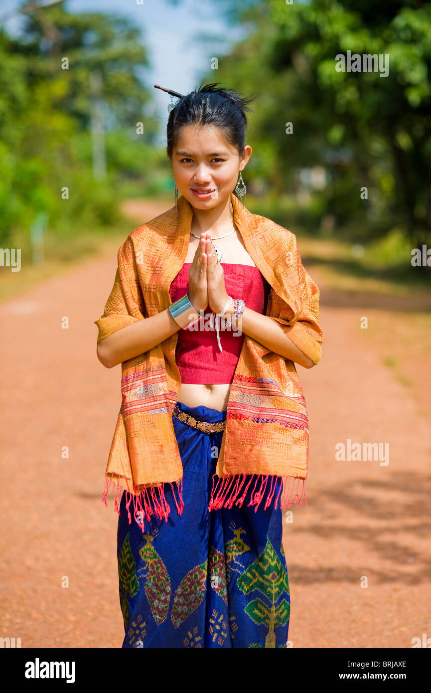 thai girl in traditional isaan style clothes with typical welcome expression Stock Photo