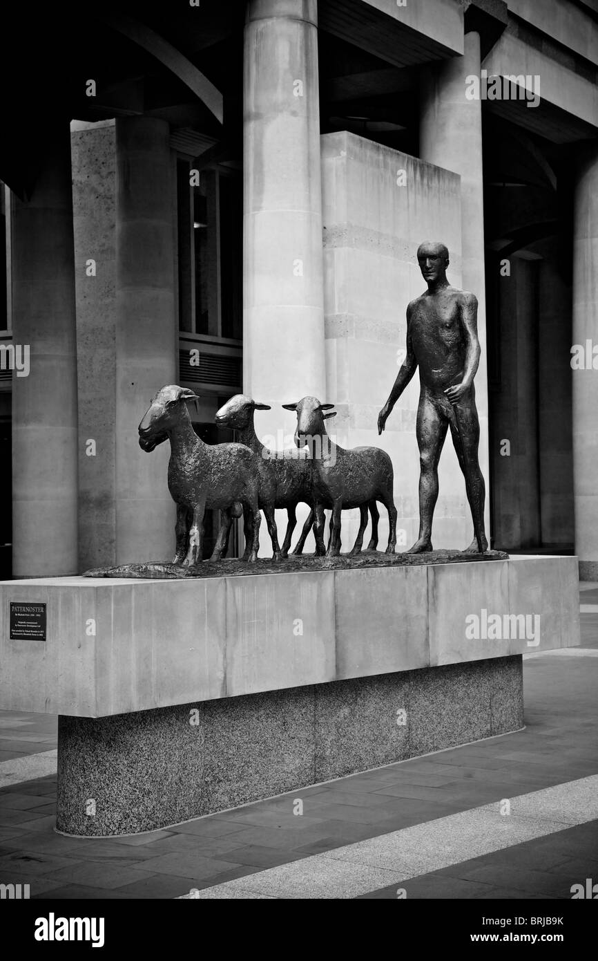 statue of man driving sheep to market in paternoster square in the city of london Stock Photo