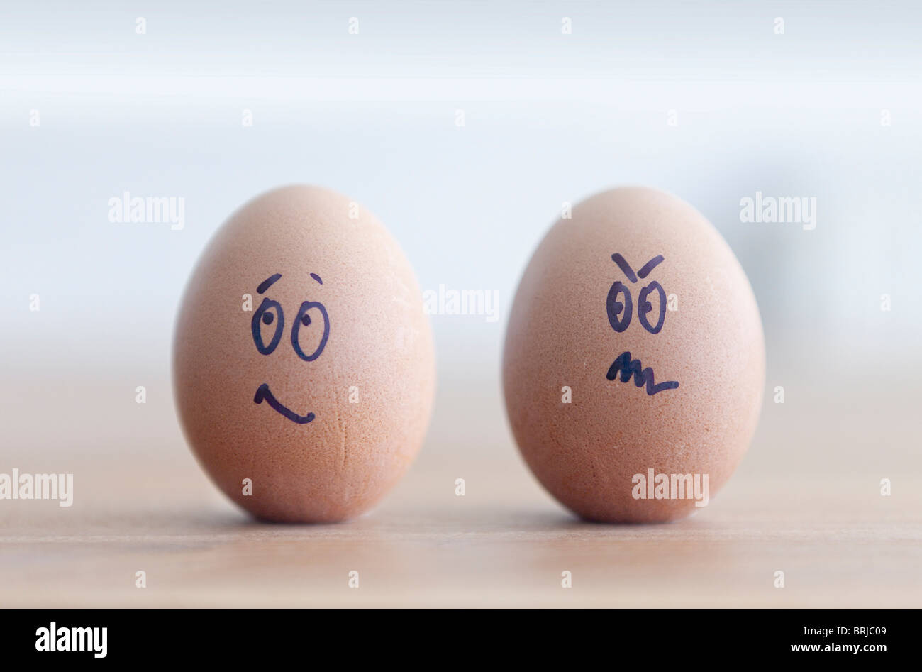 Two eggs with faces Stock Photo