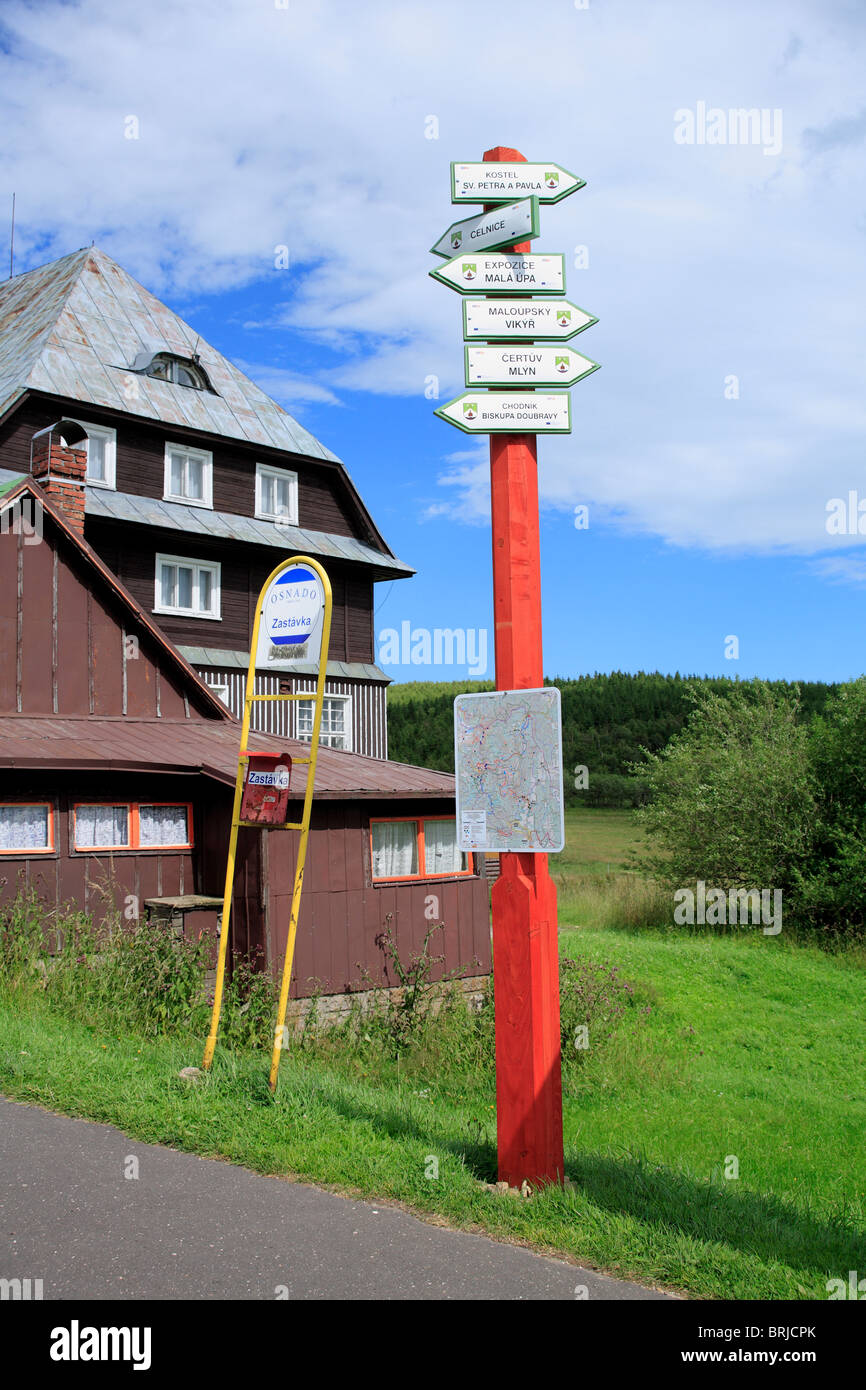 bus stop and direction sign on mainstreet in mala upa. trutnov, snezka, Krkonose, czech republic Stock Photo