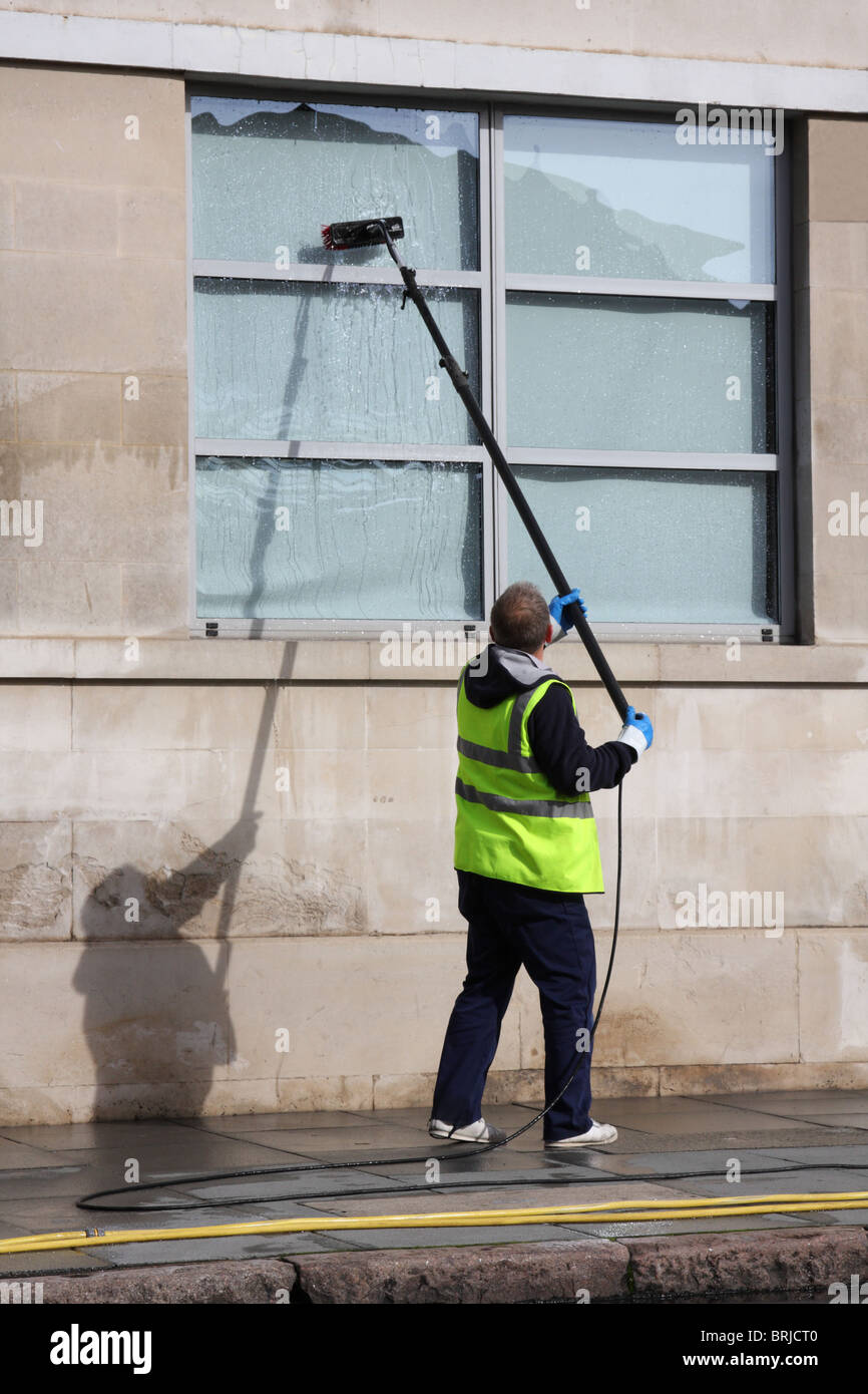 A window cleaner in a U.K. city. Stock Photo