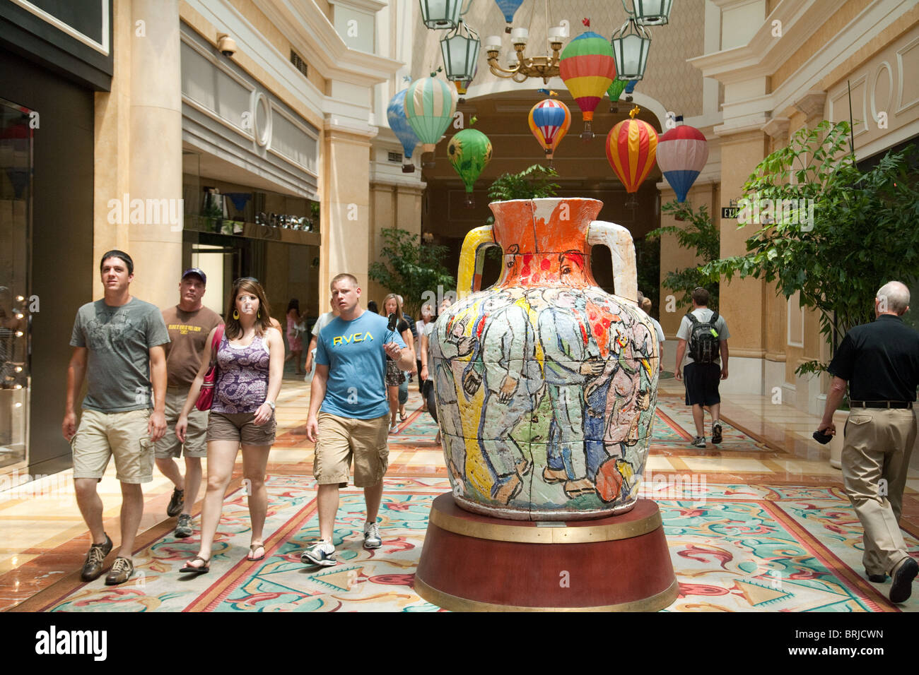 Hotel guests walking inside the Bellagio Hotel, the strip, Las Vegas USA Stock Photo