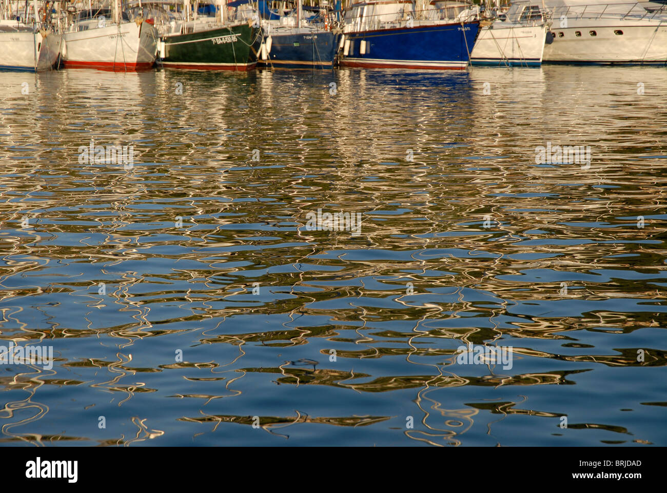 boats and reflections in the sea, Javea / Xabia, Provincia de Alicante, Comunidad Valencia, Spain Stock Photo