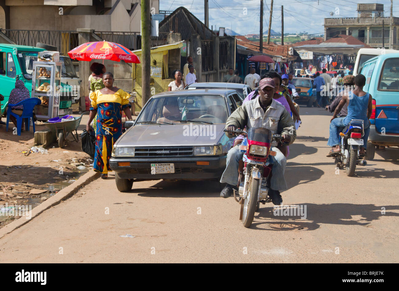 A busy street in the town of Akure, Ondo state, Nigeria. Stock Photo