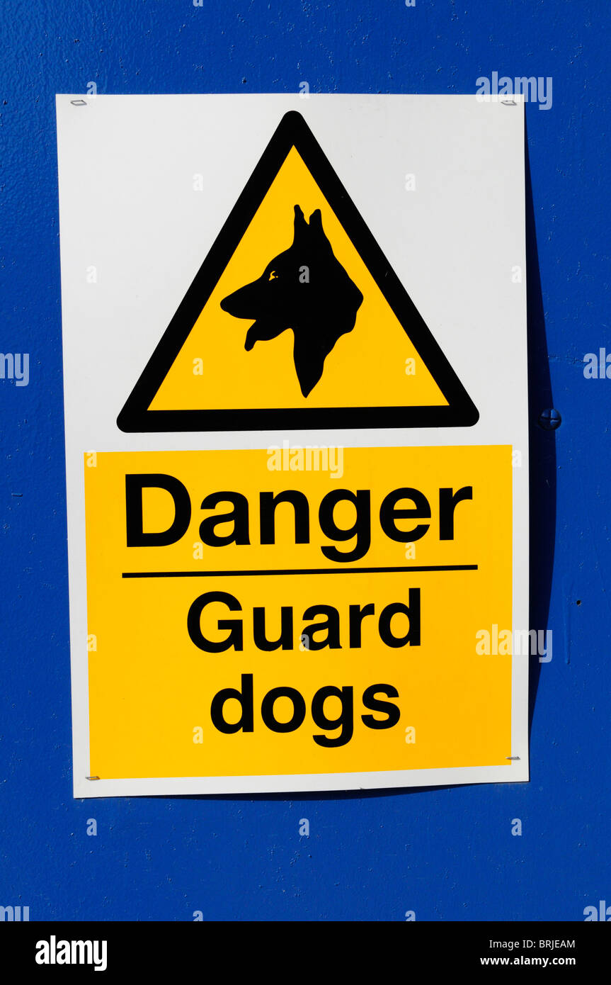 Danger Guard Dogs warning sign notice, London, England, Uk Stock Photo