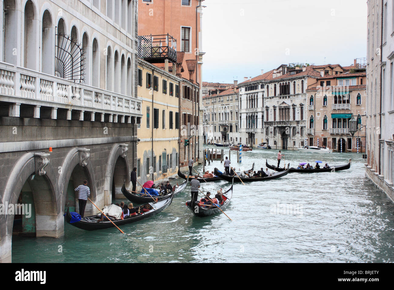 Gondola ride. Venice firehouse on the left. Stock Photo