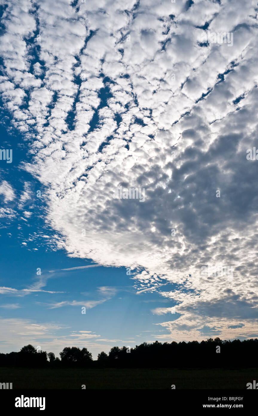 Mackerel sky / Altocumulus clouds formation - France. Stock Photo