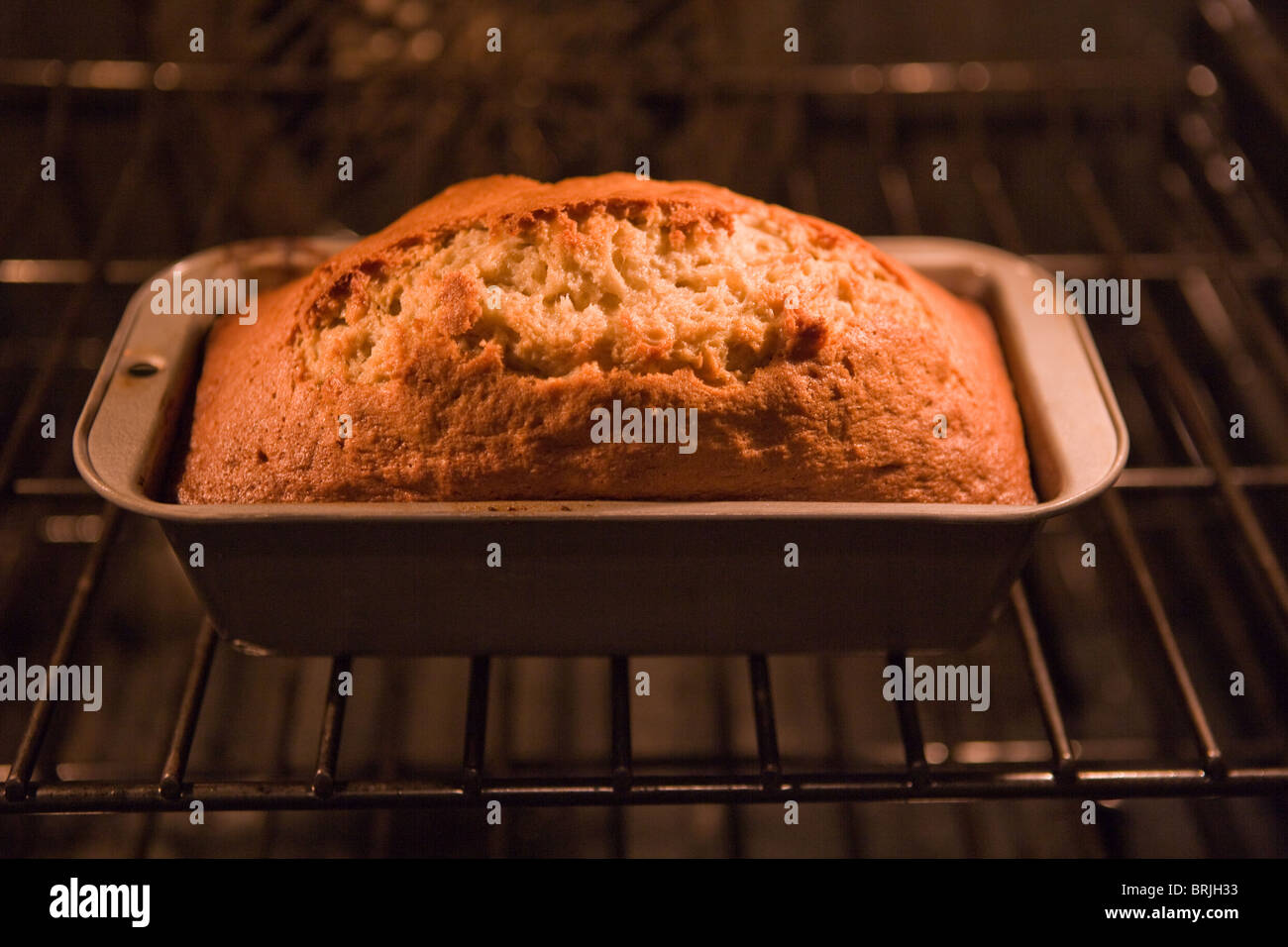 Home made banana bread baking in the oven, finished baking. Stock Photo