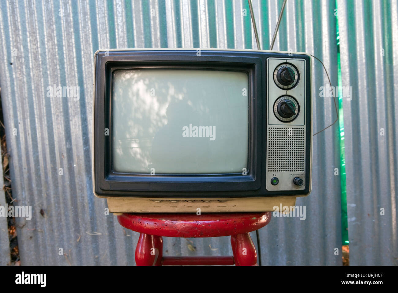Beat Up Backyard TV Set Awaits Another Broadcast Stock Photo
