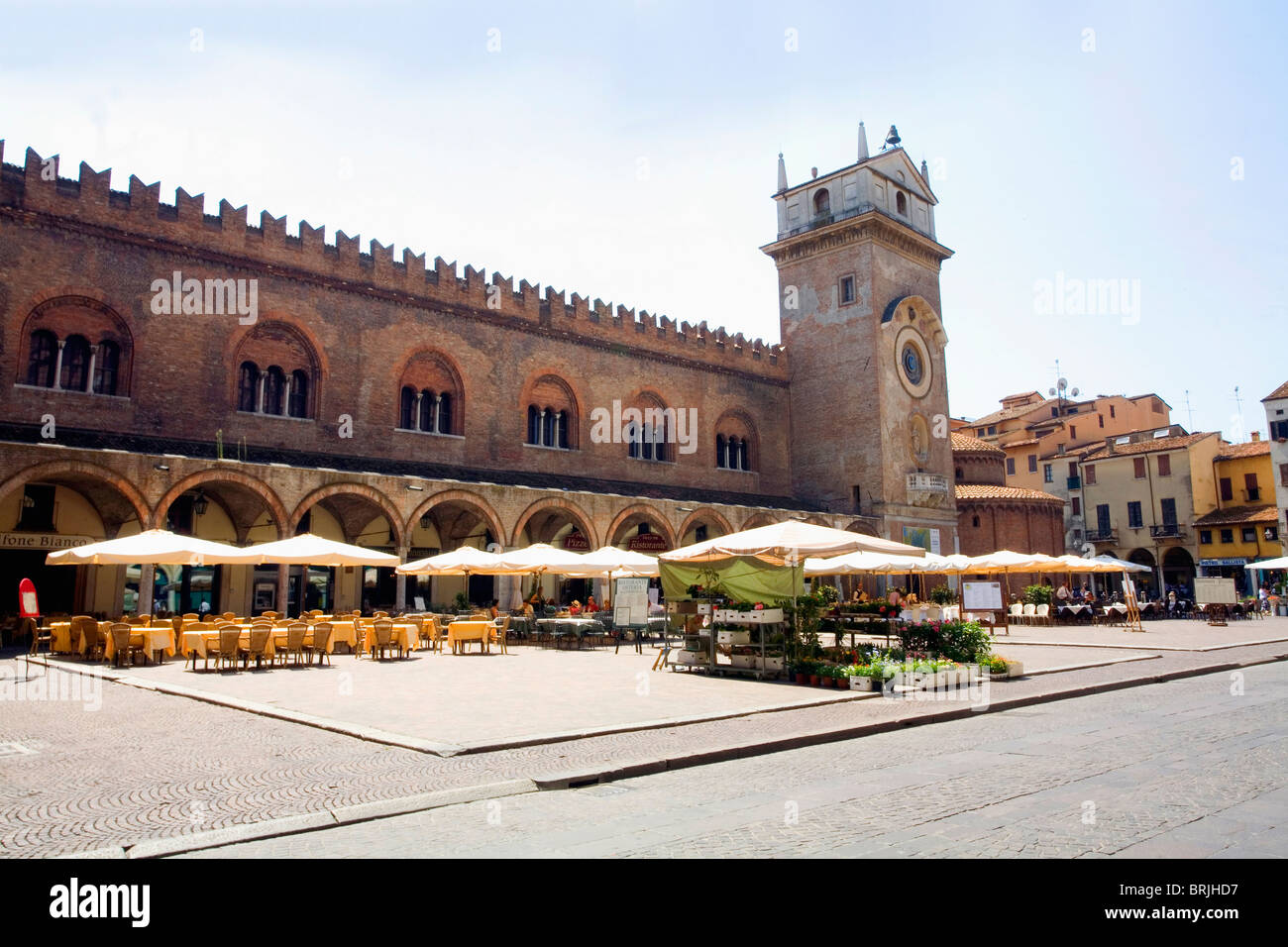 Piazza delle Erbe - a typical piazza (plaza) with the Herb Market and restaurants and shops in Mantova, Lombardia, Italy Stock Photo