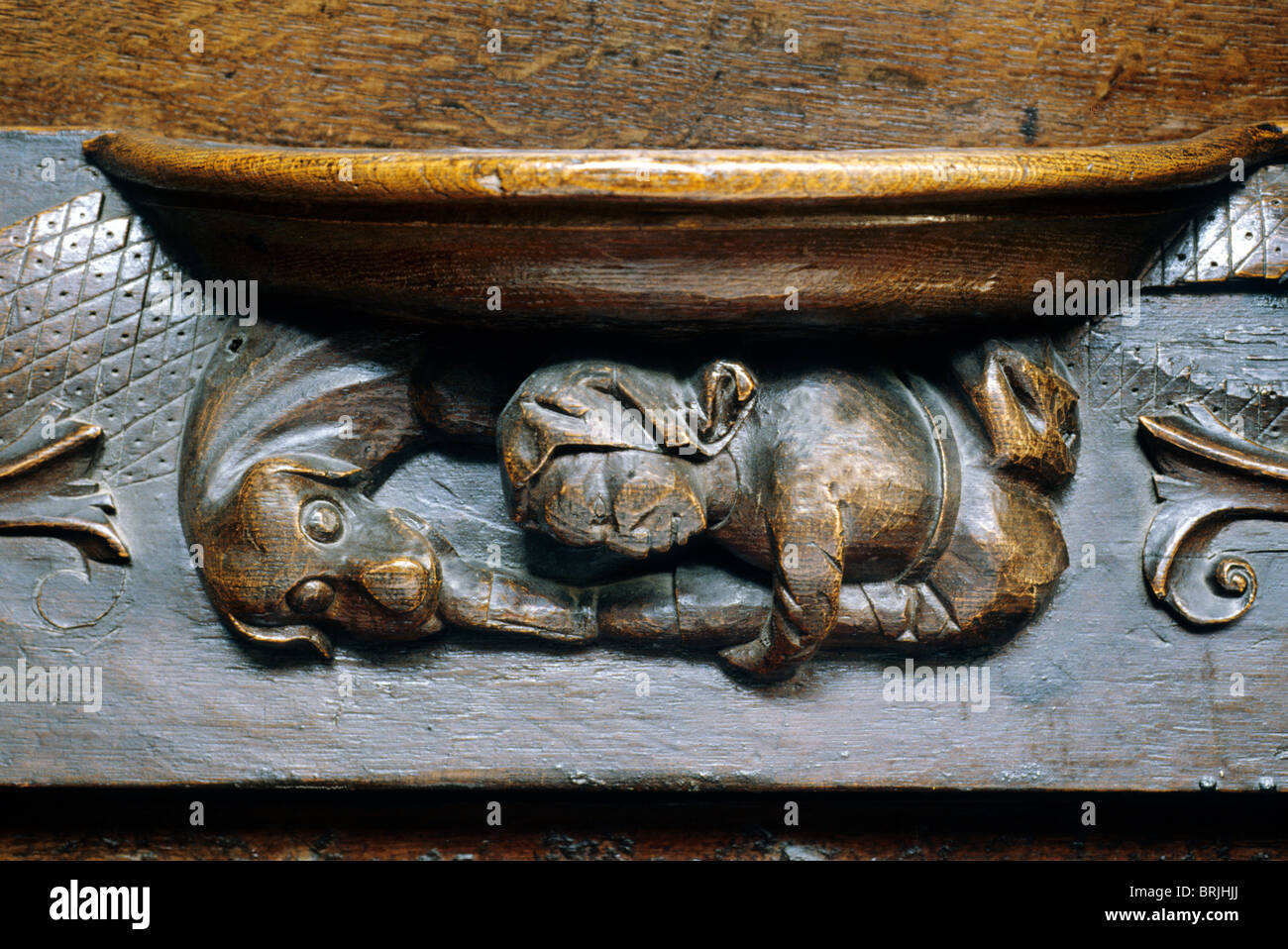 Christchurch Priory, Hampshire, misericord medieval wood carving carvings misericords English England UK piories interior Stock Photo