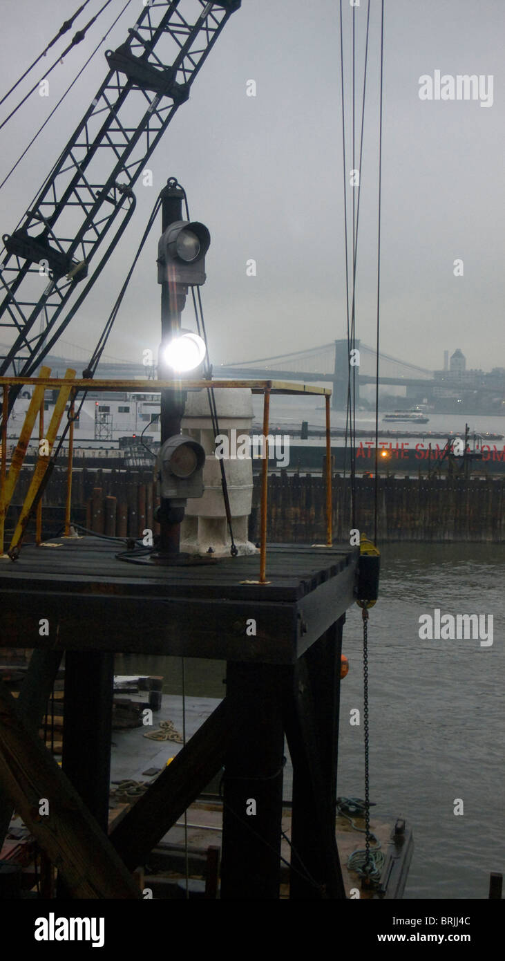 Flashing fog light at ferry slip at South Ferry Staten Island terminal on a foggy day Stock Photo