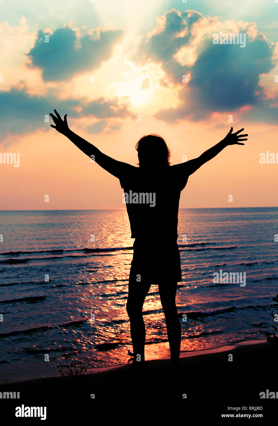 Woman sunset sky arms hi-res stock photography and images - Alamy