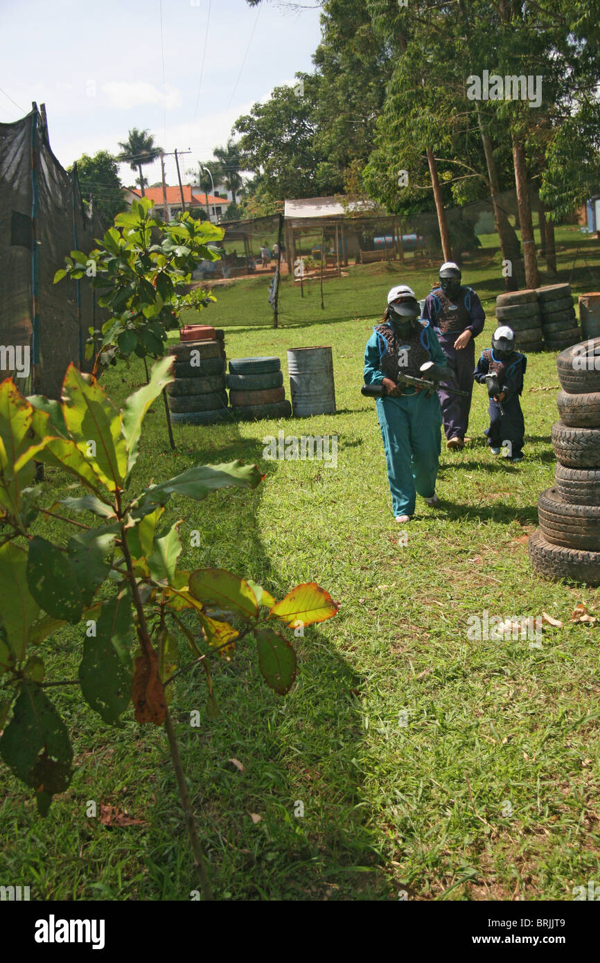 A family preparing to participate in a paintball game Stock Photo