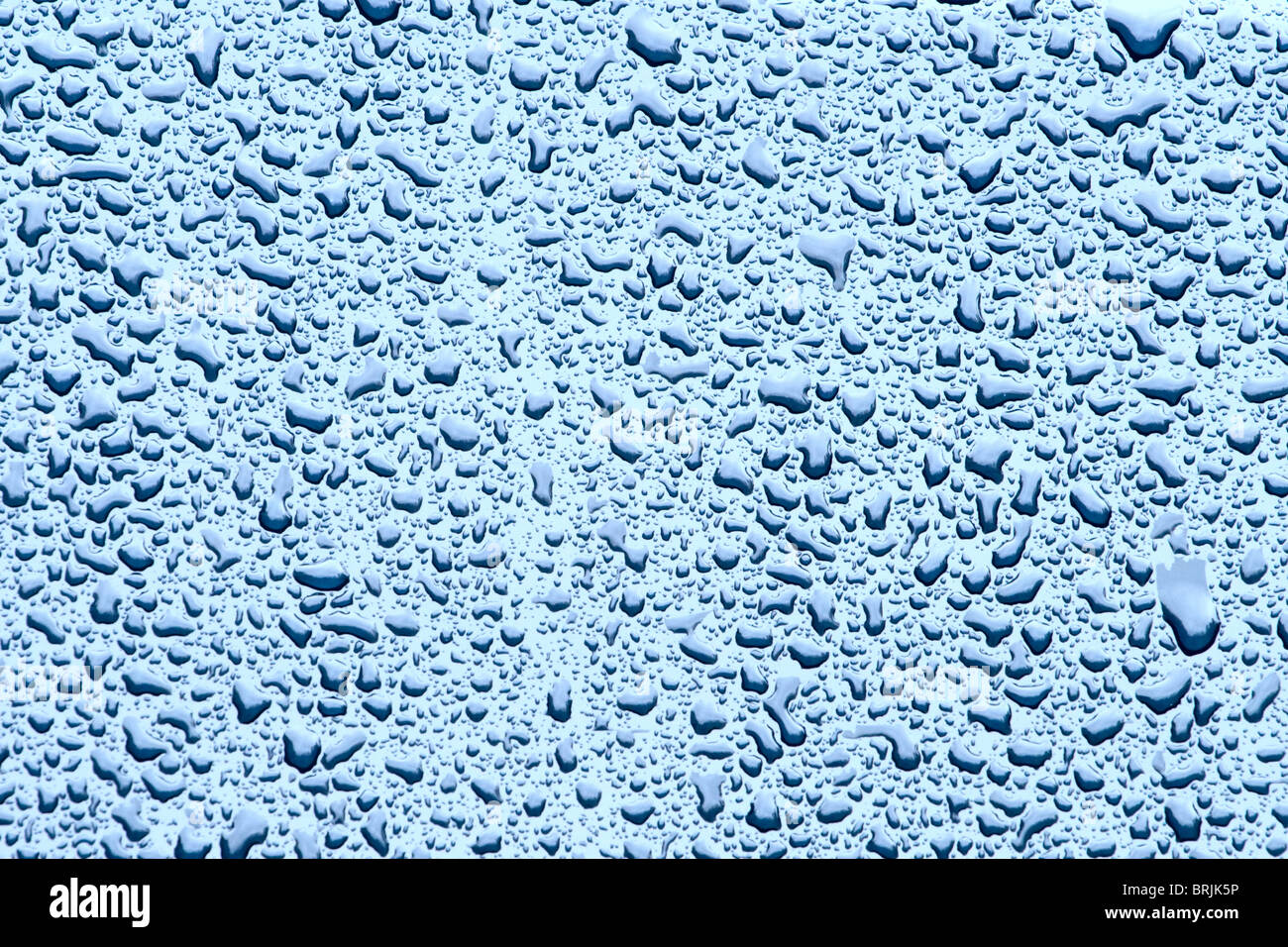 Water drops on a glass background Stock Photo - Alamy