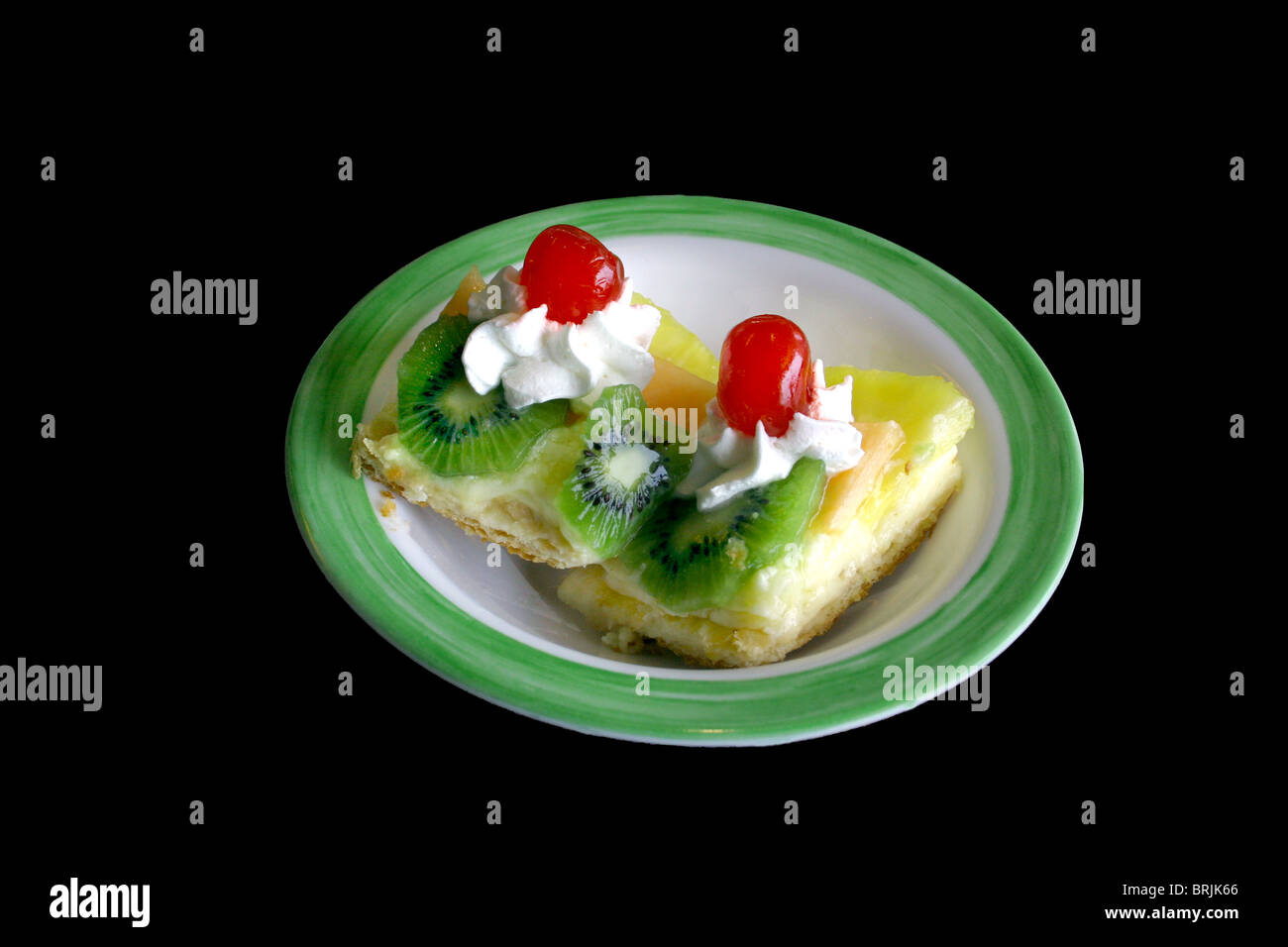 Two bite sized pastry deserts in a bowl. Stock Photo
